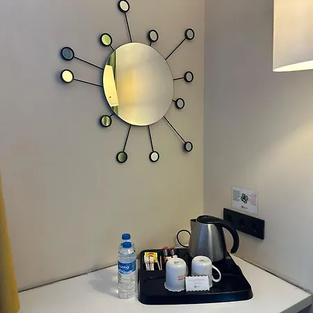 تيمبو سويتس المطار فندق